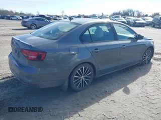 2016 Volkswagen Jetta Sport z VIN 3VWD17AJXGM302382, wystawiony jako IAAI lot #41441854 z przebiegiem 131 569 mil mil oraz . Historia ofert i sprzedaży dostępna na DreamBid. Obrazek 4.