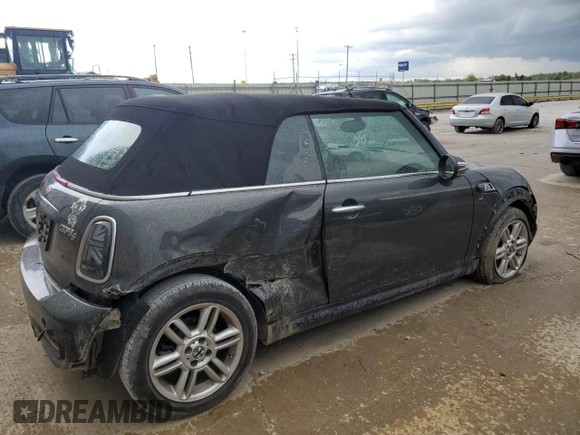2014 MINI Convertible S with VIN WMWZP3C53ET298154, listed as a Copart auction lot 53971615 with 85,499 mi miles and Salvage title. Bid and sale history available at DreamBid. Image 3.