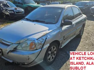 2004 Kia Rio with VIN KNADC125546325654, listed as a Copart auction lot 65521594 with 157,436 mi miles and Salvage Title. Bid and sale history available at carsss.com. Image 1.