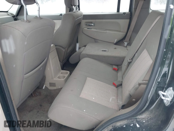 2010 Jeep Liberty Sport with VIN 1J4PN2GK2AW135363, listed as a IAAI auction lot 41008799 with 88,251 mi miles and . Bid and sale history available at DreamBid. Image 8.