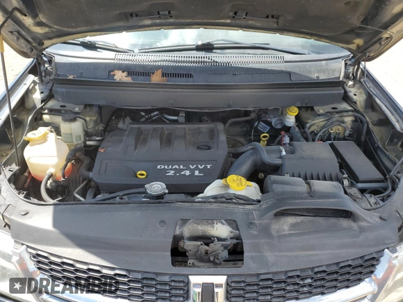 2013 Dodge Journey SE z VIN 3C4PDCAB3DT505527, wystawiony jako Copart lot #56102425 z przebiegiem 217 130 mil mil oraz Szkoda całkowita • Salvage title. Historia ofert i sprzedaży dostępna na DreamBid. Obrazek 12.