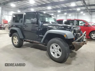 2009 Jeep Wrangler Rubicon with VIN 1J4GA64159L770895, listed as a Copart auction lot 82140864 with 209,464 mi miles and Salvage Title. Bid and sale history available at DreamBid. Image 4.