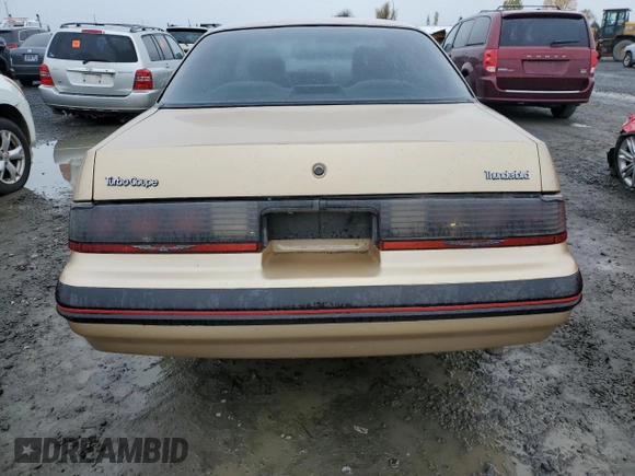 1987 Ford Thunderbird with VIN 1FABP64W7HH137025, listed as a Copart auction lot 80162264 with 137,140 mi miles and Salvage Title. Bid and sale history available at DreamBid. Image 6.