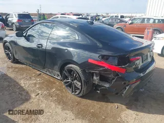 2022 BMW 4 Series 430i with VIN WBA53AP09NCJ24098, listed as a IAAI auction lot 41395007 with 34,062 mi miles and . Bid and sale history available at carsss.com. Image 3.