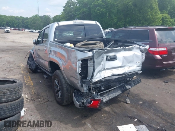 2023 Toyota Tacoma SR with VIN 3TYCZ5AN2PT176554, listed as a IAAI auction lot 42148651 with 15,255 mi miles and . Bid and sale history available at DreamBid. Image 3.