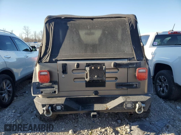 2004 Jeep Wrangler Rubicon with VIN 1J4FA69S94P778836, listed as a Copart auction lot 82884304 with 168,045 mi miles and Salvage Title. Bid and sale history available at carsss.com. Image 6.