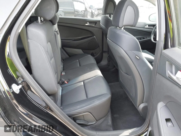 2018 Hyundai Tucson Sport with VIN KM8J33AL7JU772152, listed as a IAAI auction lot 41285203 with 87,188 mi miles. Bid and sale history available at carsss.com. Image 8.