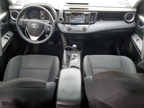 2018 Toyota RAV4 XLE with VIN 2T3WFREV2JW477138, listed as a Copart auction lot 47991815 with 128,417 mi miles and Salvage Title. Bid and sale history available at carsss.com. Image 8.
