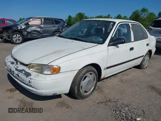 1998 Chevrolet Prizm Lsi z VIN 1Y1SK5281WZ420918, wystawiony jako IAAI lot #42360651 z przebiegiem 108 178 mil mil oraz . Historia ofert i sprzedaży dostępna na DreamBid. Obrazek 2.