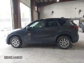 2015 Mazda CX-5 Touring with VIN JM3KE4CY6F0510002, listed as a IAAI auction lot 42045284 with 88,949 mi miles and . Bid and sale history available at DreamBid. Image 15.