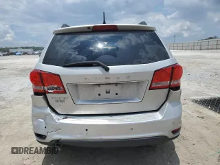 2013 Dodge Journey SXT with VIN 3C4PDCBG4DT685370, listed as a Copart auction lot 61353335 with 193,973 mi miles and Salvage title. Bid and sale history available at DreamBid. Image 6.