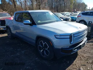2022 Rivian R1T Adventure Package with VIN 7FCTGAAA1NN012328, listed as a IAAI auction lot 41307929 with 13,588 mi miles. Bid and sale history available at carsss.com. Image 1.