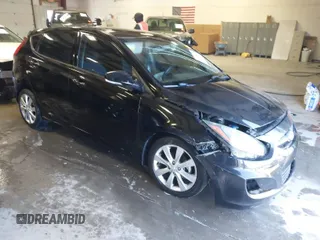 2013 Hyundai Accent SE with VIN KMHCU5AE7DU086135, listed as a IAAI auction lot 41270618 with 116,471 mi miles. Bid and sale history available at carsss.com. Image 1.