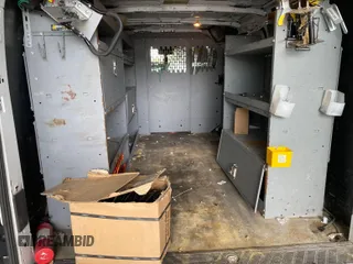 2016 Ford Transit Cargo with VIN 1FTYE1YM4GKB52041, listed as a IAAI auction lot 42284153 with 177,079 mi miles and . Bid and sale history available at DreamBid. Image 4.