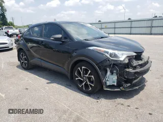 2018 Toyota C-HR XLE with VIN NMTKHMBX1JR015638, listed as a Copart auction lot 63514335 with 445,884 mi miles and Salvage title. Bid and sale history available at DreamBid. Image 4.