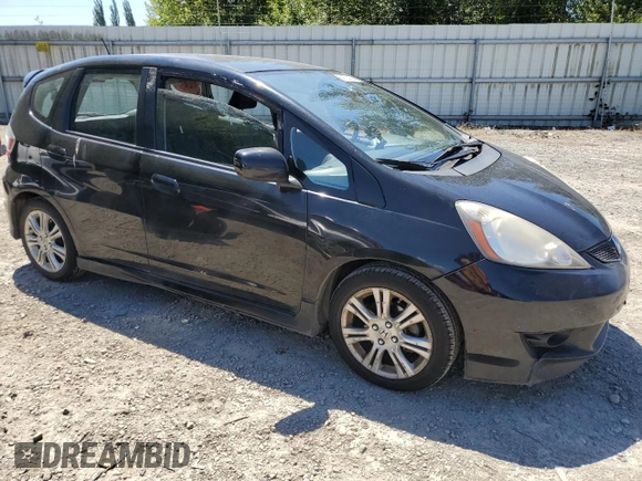 2011 Honda Fit Sport with VIN JHMGE8H57BC024827, listed as a Copart auction lot 59704194 with 146,316 mi miles and Salvage Title. Bid and sale history available at DreamBid. Image 4.
