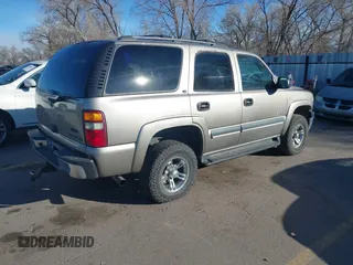 2002 Chevrolet Tahoe Z71 with VIN 1GNEK13Z32R125421, listed as a IAAI auction lot 41859011 with 216,021 mi miles. Bid and sale history available at carsss.com. Image 4.