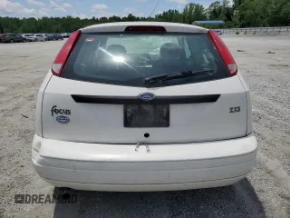 2003 Ford Focus ZX3 with VIN 3FAFP31383R117755, listed as a Copart auction lot 60668725 with 135,856 mi miles and Salvage title. Bid and sale history available at DreamBid. Image 6.