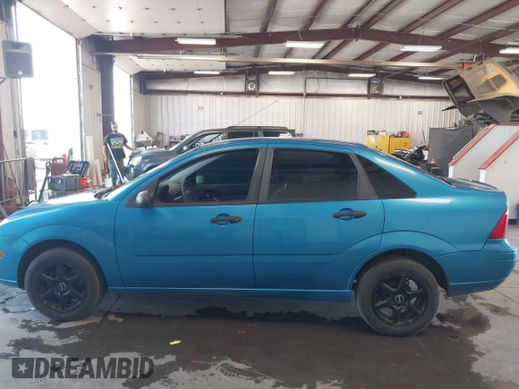 2007 Ford Focus S with VIN 1FAFP34N27W262385, listed as a IAAI auction lot 42526524 with 183,733 mi miles and . Bid and sale history available at DreamBid. Image 14.