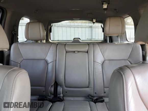 2013 Honda Pilot EX-L с VIN 5FNYF4H76DB076744, выставлен на аукционе Copart как лот 48924305 с пробегом 223 542 миль миль и Списание • Salvage title. История ставок и продаж доступна на DreamBid. Изображение 10.