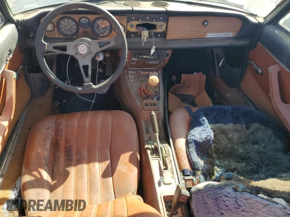 1979 FIAT 124 Spider z VIN 124C520160260, wystawiony jako Copart lot #77263224 z przebiegiem 68 917 mil mil oraz Czysty tytuł • Clean title. Historia ofert i sprzedaży dostępna na DreamBid. Obrazek 8.