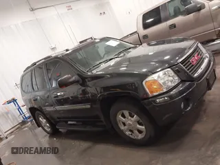 2005 GMC Envoy SLT z VIN 1GKDT13S852281122, wystawiony jako IAAI lot #42292577 z przebiegiem 156 052 mil mil oraz . Historia ofert i sprzedaży dostępna na DreamBid. Obrazek 13.
