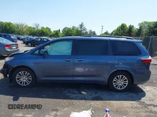 2015 Toyota Sienna XLE with VIN 5TDYK3DC0FS649998, listed as a IAAI auction lot 42531828 with 111,539 mi miles and . Bid and sale history available at DreamBid. Image 15.