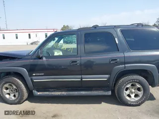 2003 Chevrolet Tahoe Z71 with VIN 1GNEK13Z13R166468, listed as a IAAI auction lot 41848131 with 163,738 mi miles. Bid and sale history available at carsss.com. Image 14.