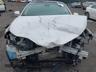 2014 Lincoln MKZ with VIN 3LN6L2J99ER819229, listed as a IAAI auction lot 41005075 with Not Provided miles. Bid and sale history available at carsss.com. Image 12.