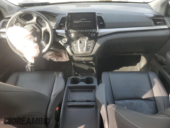 2023 Honda Odyssey Touring with VIN 5FNRL6H83PB053962, listed as a Copart auction lot 51461865 with 24,808 mi miles and Salvage Title. Bid and sale history available at DreamBid. Image 8.