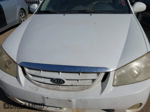 2004 Kia Spectra LX with VIN KNAFE121745036331, listed as a IAAI auction lot 41735613 with 67,634 mi miles. Bid and sale history available at carsss.com. Image 10.