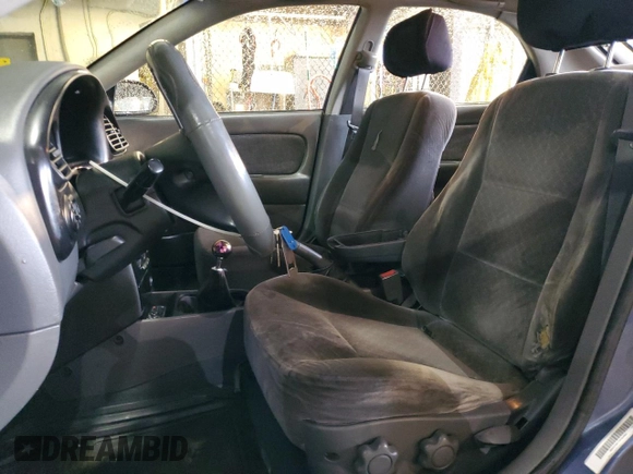 2003 Kia Spectra GS z VIN KNAFB161135104592, wystawiony jako Copart lot #52097205 z przebiegiem 119 206 mil mil oraz Szkoda całkowita • Salvage title. Historia ofert i sprzedaży dostępna na DreamBid. Obrazek 7.