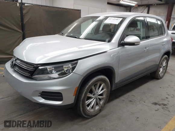 2017 Volkswagen Tiguan S with VIN WVGBV7AX6HK042814, listed as a IAAI auction lot 41742587 with 89,086 mi miles and . Bid and sale history available at DreamBid. Image 2.