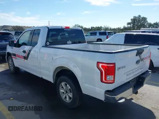 2017 Ford F-150 XL with VIN 1FTEX1CG9HKD76051, listed as a IAAI auction lot 41673314 with 236,509 mi miles and . Bid and sale history available at DreamBid. Image 3.