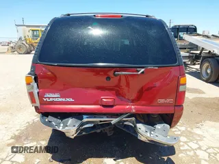 2003 GMC Yukon XL SLT z VIN 1GKEC16Z63J166423, wystawiony jako IAAI lot #42330690 z przebiegiem 190 589 mil mil oraz . Historia ofert i sprzedaży dostępna na DreamBid. Obrazek 16.