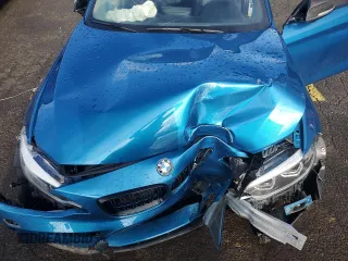 2018 BMW M2 z VIN WBS1J5C59JVD36008, wystawiony jako Copart lot #87876685 z przebiegiem 24 255 mil mil oraz Szkoda całkowita • Salvage title. Historia ofert i sprzedaży dostępna na DreamBid. Obrazek 11.