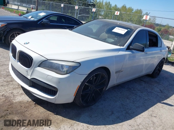 2012 BMW 7 Series 750Li with VIN WBAKB8C52CDX20757, listed as a IAAI auction lot 42057654 with 137,947 mi miles. Bid and sale history available at carsss.com. Image 2.