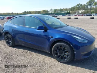 2021 Tesla Model Y Long Range z VIN 5YJYGDEE5MF089548, wystawiony jako IAAI lot #42154866 z przebiegiem 56 910 mil mil oraz . Historia ofert i sprzedaży dostępna na DreamBid. Obrazek 1.