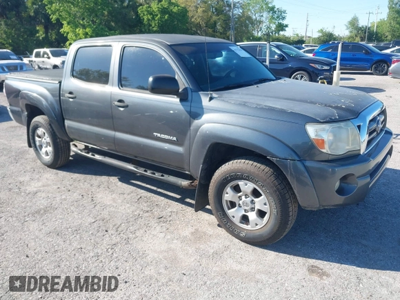 2009 Toyota Tacoma PreRunner with VIN 3TMJU62N59M088137, listed as a IAAI auction lot 41775410 with 217,331 mi miles. Bid and sale history available at carsss.com. Image 1.