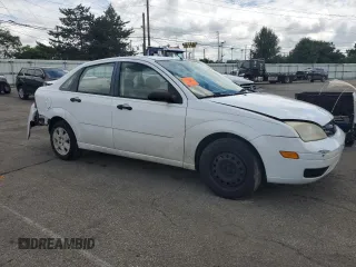2007 Ford Focus S with VIN 1FAFP34N87W343035, listed as a Copart auction lot 63419335 with Not provided miles and Salvage title. Bid and sale history available at DreamBid. Image 4.