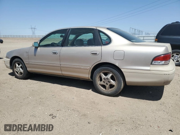 1997 Toyota Avalon XL with VIN 4T1BF12B0VU187179, listed as a Copart auction lot 54708565 with 336,922 mi miles and Salvage Title. Bid and sale history available at DreamBid. Image 2.