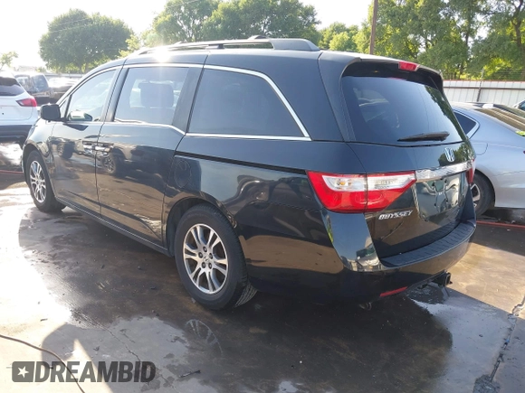 2013 Honda Odyssey EX-L with VIN 5FNRL5H6XDB090768, listed as a IAAI auction lot 42008759 with 116,052 mi miles and . Bid and sale history available at carsss.com. Image 3.