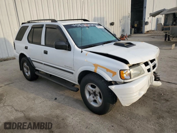 2003 Isuzu Rodeo with VIN 4S2DM58W034303129, listed as a Copart auction lot 83757734 with 114,274 mi miles and Salvage Title. Bid and sale history available at DreamBid. Image 4.