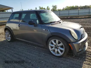 2003 MINI Hardtop S with VIN WMWRE33423TD73097, listed as a Copart auction lot 54743065 with 166,289 mi miles and Clean Title. Bid and sale history available at DreamBid. Image 4.