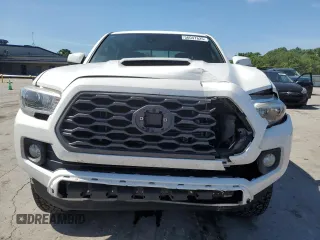 2020 Toyota Tacoma SR5 with VIN 3TMCZ5AN9LM296891, listed as a Copart auction lot 56047625 with 74,301 mi miles and Salvage title. Bid and sale history available at DreamBid. Image 5.
