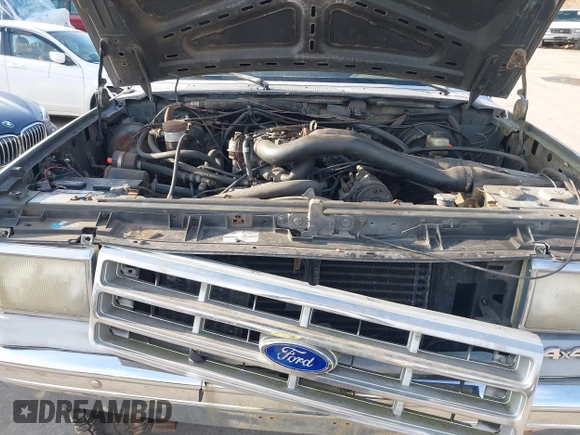 1988 Ford F-250 with VIN 1FTHF26H0JNA06718, listed as a IAAI auction lot 41530940 with 77,610 mi miles. Bid and sale history available at carsss.com. Image 10.