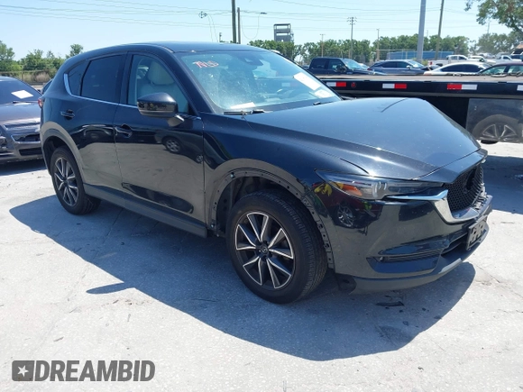 2017 Mazda CX-5 Grand Touring with VIN JM3KFBDL6H0200830, listed as a IAAI auction lot 42005145 with 90,510 mi miles. Bid and sale history available at carsss.com. Image 1.