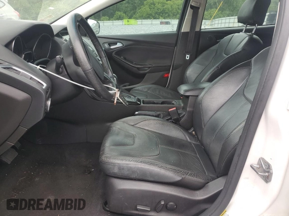 2016 Ford Focus Titanium with VIN 1FADP3N22GL292399, listed as a Copart auction lot 63033385 with 180,653 mi miles and Clean title. Bid and sale history available at DreamBid. Image 7.