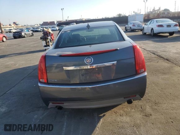 2010 Cadillac CTS with VIN 1G6DA5EG0A0133864, listed as a Copart auction lot 42970405 with 123,946 mi miles and Salvage Title. Bid and sale history available at DreamBid. Image 6.