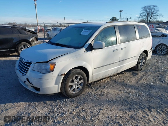 2010 Chrysler Town & Country Touring with VIN 2A4RR5D18AR310587, listed as a IAAI auction lot 41223813 with 144,626 mi miles. Bid and sale history available at carsss.com. Image 2.